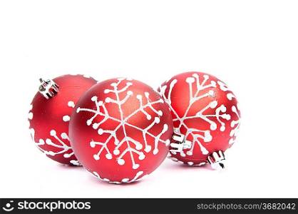 Christmas bauble decorations against white background