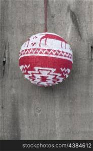 Christmas bauble ornament on rustic style grunge background