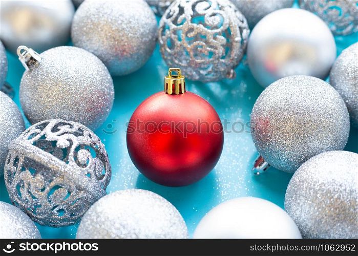 Christmas baubles decoration on blue background.