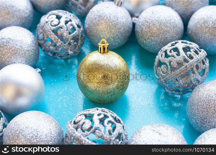 Christmas baubles decoration on blue background.