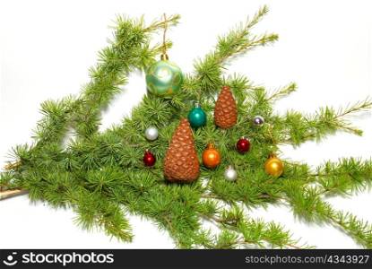Christmas baubles, fir tree and decoration isolated on white