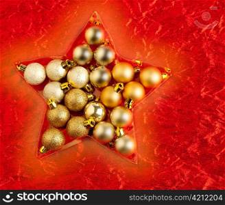 christmas baubles in star shape on red background