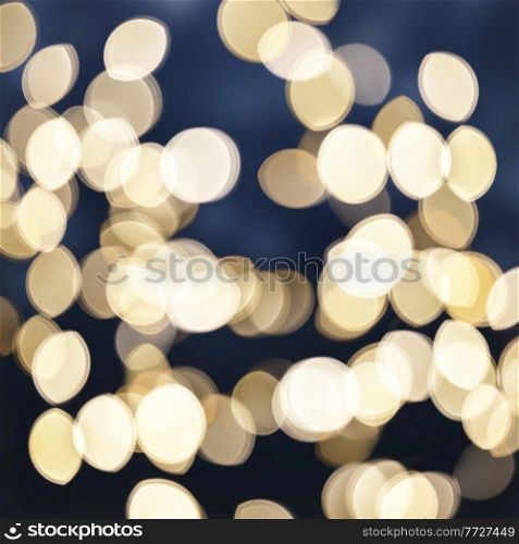 christmas  blue background with golden bokeh light beams. christmas background