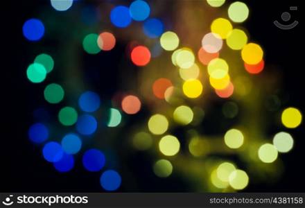 christmas bokeh background, xmas wallpaper of blurred spot of lights, cityscape at night