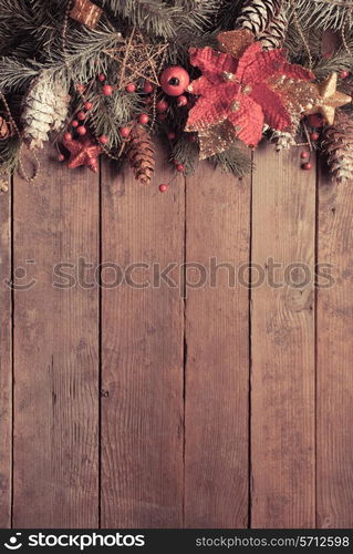 Christmas border design on the wooden background