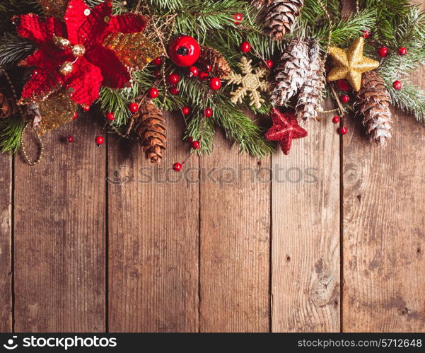 Christmas border design on the wooden background