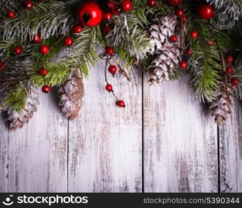 Christmas border design with snow covered pinecones