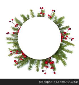 Christmas Border frame of tree branches and red berries on white background with copy space isolated. Christmas frame of tree branches