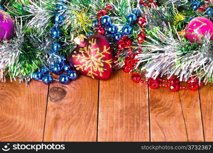 Christmas border with decoration, ornament on a wooden background