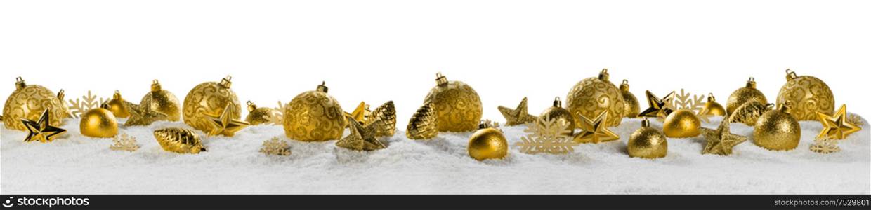 Christmas border with golden ornaments on snow isolated on white background. Christmas border with golden ornaments