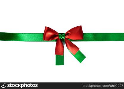 Christmas bow on white. Red and green christmas ribbon bow isolated on white background