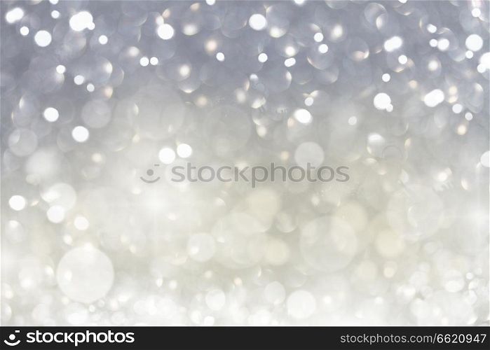christmas bright silver lights bokeh defocused background. christmas lights defocused background