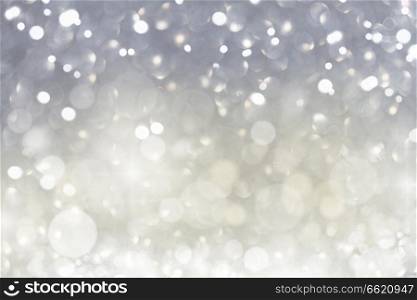 christmas bright silver lights bokeh defocused background. christmas lights defocused background