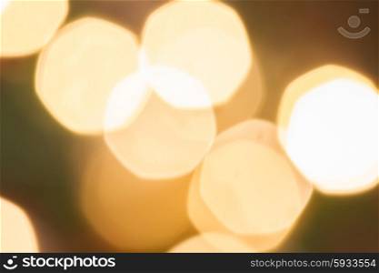 christmas bright yellow lights bokeh defocused background. christmas lights defocused background