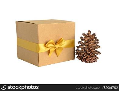 Christmas brown gift boxes with gold bow and pine cone isolated on white background