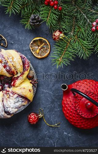 Christmas cake and Christmas tree. Christmas bun background with Christmas tree and decorations