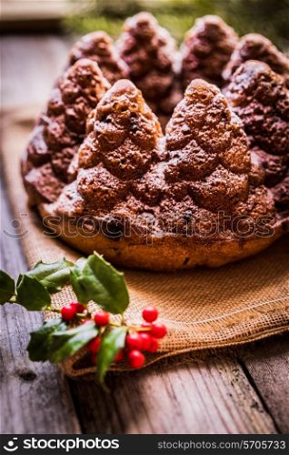 Christmas cake on wooden background