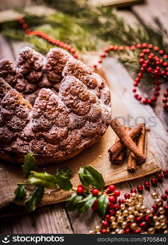 Christmas cake on wooden background