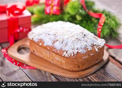christmas cake with spice on the wooden table