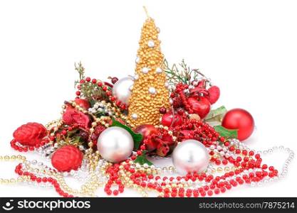 Christmas candle and decoration with red apples isolated on white background.