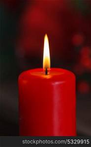 Christmas candle in red. Decoration for holidays