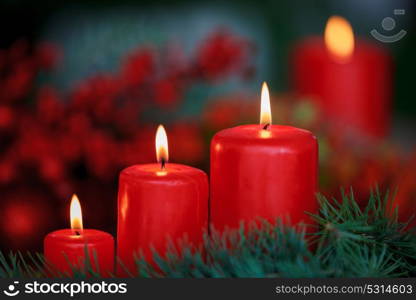 Christmas candles in red. Decoration for holidays