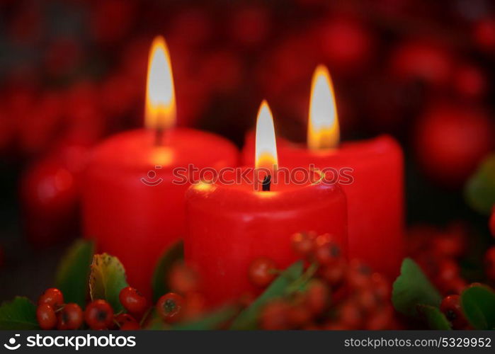 Christmas candles in red. Decoration for holidays