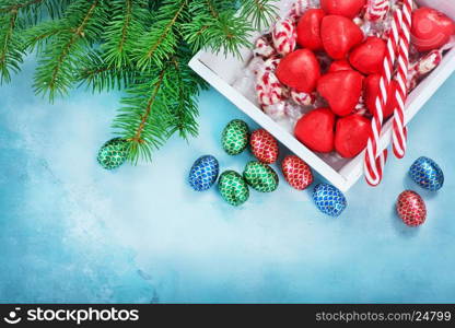 christmas candy on a table, chocolate candy and christmas decoration