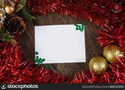 Christmas card. Christmas card with decoration balls and tinsel. Place for text
