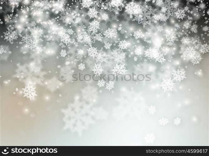 Christmas card. Conceptual image with snowflakes on silver background