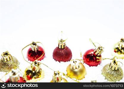 Christmas card, illustration with golden baubles, balls, decorations, ornaments on a silver white background with blurry, blurred, lights (bokeh), soft, neutral, warm colors and Merry Christmas text