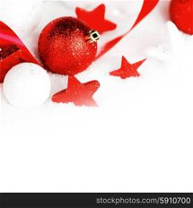 Christmas card with beautiful red decorations in snow