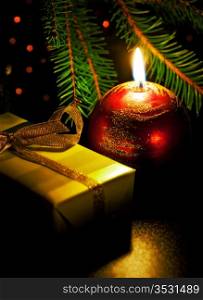 christmas card with candle and gift box