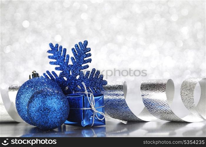Christmas card with colorful decoration on silver background