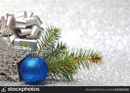 Christmas card with fir branch and colorful decoration