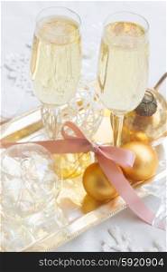 Christmas champagne. Two glasses of christmas champagne with bubbles
