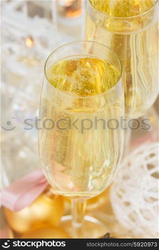 Christmas champagne. Two glasses of christmas champagne with bubbles close up