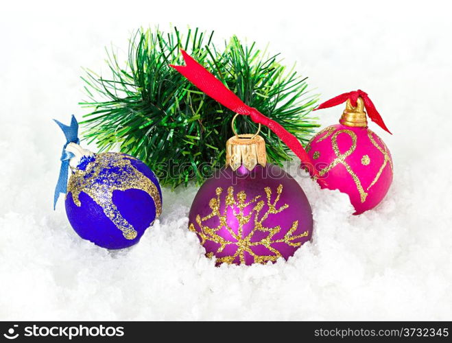 Christmas composition, decoration, gold Christmas ball in winter snow with