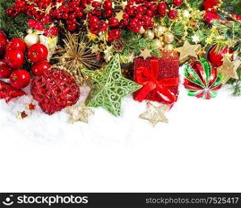 Christmas composition red baubles und golden decoration on white background