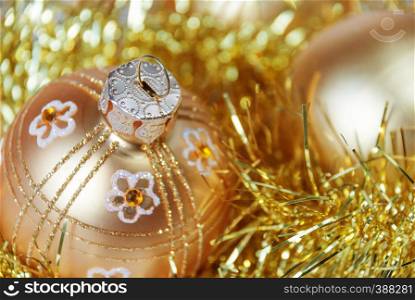 Christmas composition with Christmas balls and golden tinsel