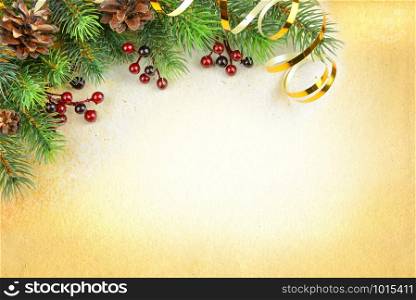 Christmas compositionon with green spruce branches, cones, red holly berries and golden serpentine on a background of old paper
