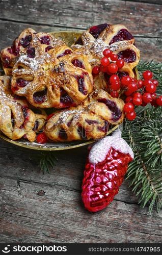Christmas cookies and toy. Christmas bun with jam with Christmas tree and decorations