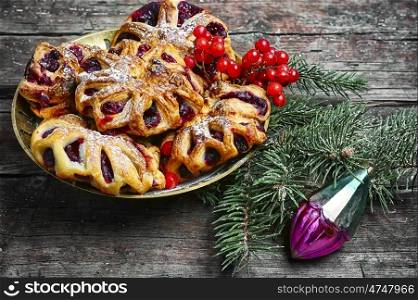 Christmas cookies and toy. Christmas bun with jam with Christmas tree and decorations