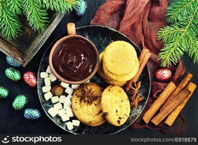 christmas cookies on plate and on a table