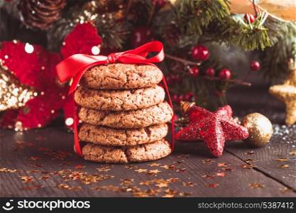 Christmas cookies on the table with red ribbon