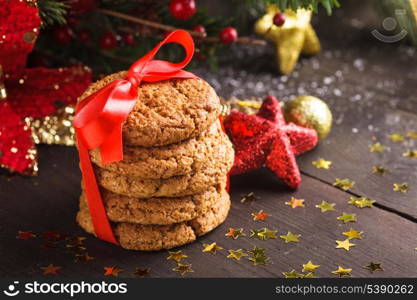 Christmas cookies on the table with red ribbon