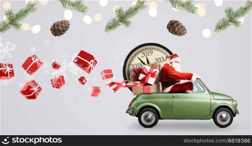 Christmas countdown arriving. Santa Claus on car delivering New Year gifts and clock at gray background. Santa Claus countdown on car