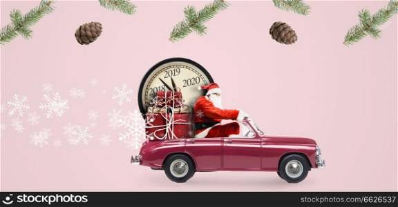 Christmas countdown arriving. Santa Claus on car delivering New Year gifts and clock at pink background. Santa Claus countdown on car