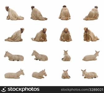 Christmas crib isolated on white statuettes representing a King and a donkey.