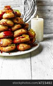Christmas croquembouche cake. croquembouche cake decorated with caramel threads and cranberries with marmalade